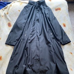 Woman Within Raincoat